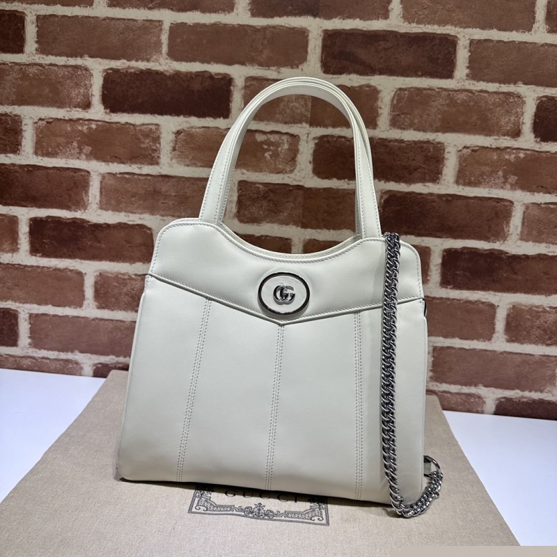 G*u*i top handle bags